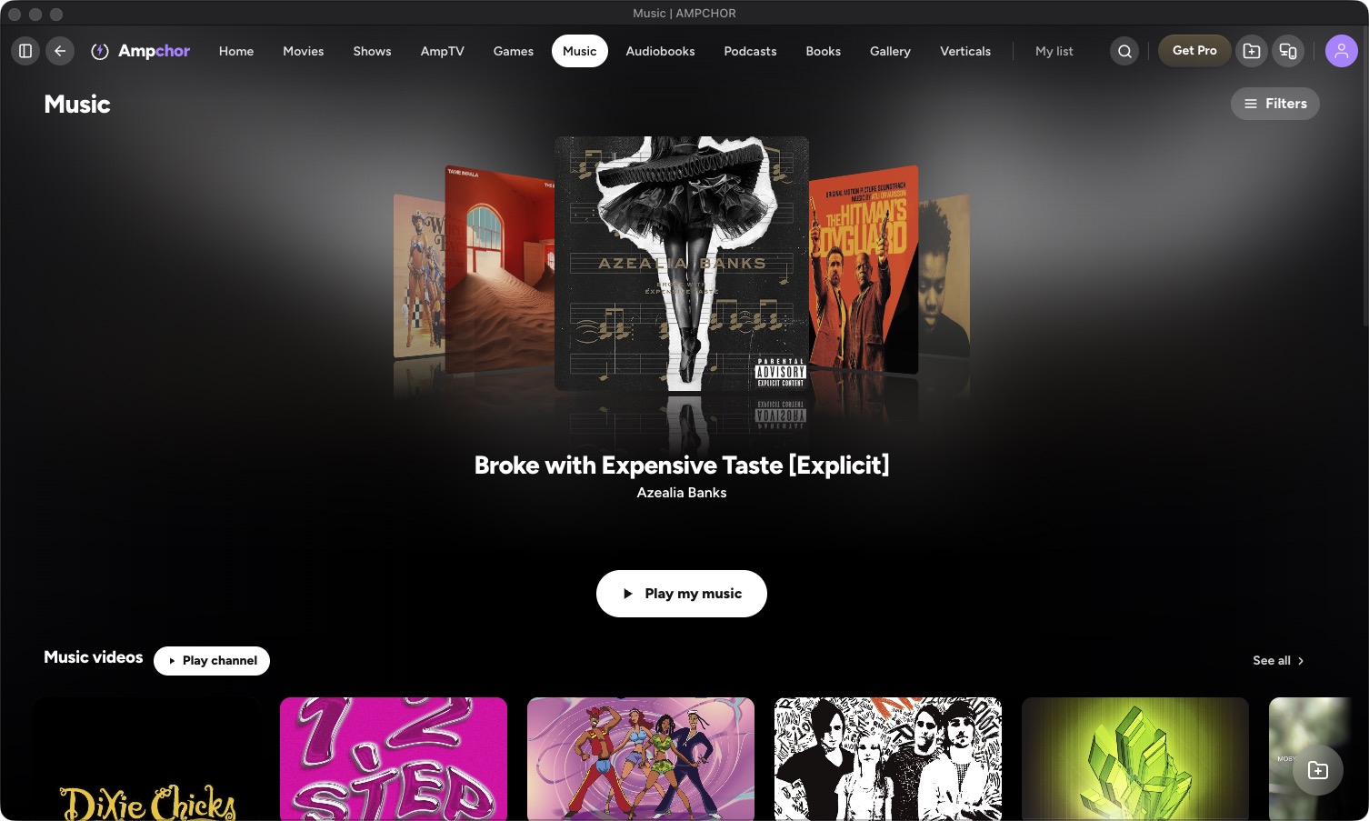 The Music page on a computer: albums in a swipe, a Play button and the music videos row