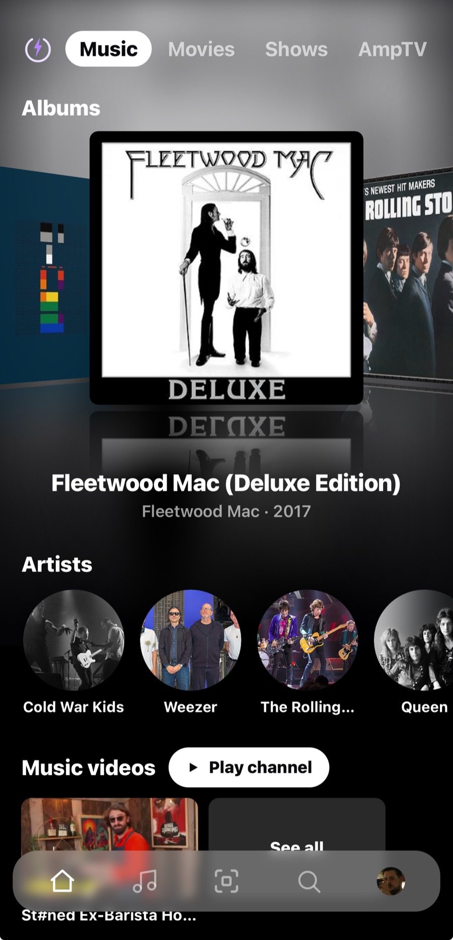 The Music page on a phone: albums in a swipe, then artists and music videos